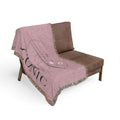 Cuddle up with Iconic woven blanket